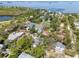 A beautiful waterfront neighborhood is shown in this aerial view of the community at 408 Georgia Ave, Crystal Beach, FL 34681
