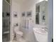 Clean bathroom features a glass enclosed shower and modern sink at 408 Georgia Ave, Crystal Beach, FL 34681