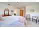 Large bedroom featuring seating area and en suite entrance at 408 Georgia Ave, Crystal Beach, FL 34681