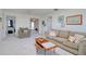 Comfortable living room boasts neutral tones, stylish decor, and cozy seating at 408 Georgia Ave, Crystal Beach, FL 34681