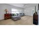 Inviting living room with modern wood floors and a large sectional sofa at 408 Georgia Ave, Crystal Beach, FL 34681