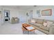 Comfortable living room boasts neutral tones, stylish decor, and cozy seating at 408 Georgia Ave, Crystal Beach, FL 34681