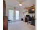 Bright office featuring shelving, desk space, and access to exterior at 408 Georgia Ave, Crystal Beach, FL 34681