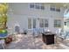 Backyard patio features a fire pit and seating for relaxation at 408 Georgia Ave, Crystal Beach, FL 34681