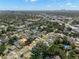 Overhead view showcasing the home's location and nearby urban amenities with city skyline in the distance at 4114 W Neptune St, Tampa, FL 33629