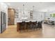 Spacious kitchen with a large island, stainless steel appliances, and an adjacent dining area at 4114 W Neptune St, Tampa, FL 33629