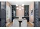 Stylish office with custom built-ins, hardwood floors, and modern lighting at 4114 W Neptune St, Tampa, FL 33629