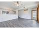 Open-concept living room with hardwood floors and ample space for entertaining at 498 Lakeview Dr # 45, Palm Harbor, FL 34683