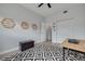 Bright office with hexagon shelves and a black and white patterned rug at 505 Broxburn Ave, Temple Terrace, FL 33617