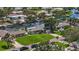 Charming home featuring a manicured lawn, a two-car garage, and a cozy residential setting at 5285 Dover Ne St, St Petersburg, FL 33703