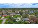 Aerial view of a waterfront neighborhood featuring lush landscaping, canals, and easy access to the open ocean at 5285 Dover Ne St, St Petersburg, FL 33703