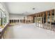 Large open living area featuring bright natural light and a remodeling-ready layout at 5285 Dover Ne St, St Petersburg, FL 33703