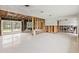 Spacious open floor plan ready for renovation, with ample natural light and great views at 5285 Dover Ne St, St Petersburg, FL 33703