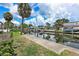 Scenic waterfront featuring private boat docks and lush landscaping along the water at 5285 Dover Ne St, St Petersburg, FL 33703
