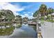 Beautiful waterfront canal view with lush foliage and serene water reflections at 5285 Dover Ne St, St Petersburg, FL 33703