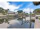 Scenic waterfront property featuring boat lifts, docks and a charming two story house at 5285 Dover Ne St, St Petersburg, FL 33703