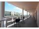 Spacious balcony with ocean and building views, complete with comfortable seating at 6025 Shore S Blvd # 408, Gulfport, FL 33707