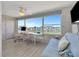 Bright bedroom featuring views of the water and community at 6025 Shore S Blvd # 408, Gulfport, FL 33707