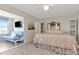 Bedroom featuring view of the water and a futon at 6025 Shore S Blvd # 408, Gulfport, FL 33707
