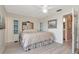 Bedroom with a comfortable bed and plenty of storage at 6025 Shore S Blvd # 408, Gulfport, FL 33707