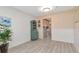 Open dining area with stylish gray flooring and a view into the kitchen at 6025 Shore S Blvd # 408, Gulfport, FL 33707