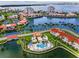 Stunning aerial view of the community, showcasing its waterfront location, lush landscaping, and resort-style amenities at 6080 Bahia Del Mar Cir # 109, St Petersburg, FL 33715