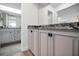 Tastefully updated bathroom featuring granite countertops and neutral walls and updated cabinets at 6080 Bahia Del Mar Cir # 109, St Petersburg, FL 33715