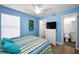 Bedroom featuring an en-suite bathroom and a walk-in closet for added convenience at 6080 Bahia Del Mar Cir # 109, St Petersburg, FL 33715