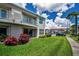 Well-maintained condo with manicured lawn, a patio, and beautiful landscaping offers a welcoming and inviting atmosphere at 6080 Bahia Del Mar Cir # 109, St Petersburg, FL 33715