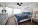 Stylish main bedroom with coastal design and ample natural light from bright windows at 6080 Bahia Del Mar Cir # 109, St Petersburg, FL 33715