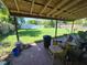 Large backyard with patio, wood fence, and ample space for outdoor activities and entertaining at 6326 38Th N Ave, St Petersburg, FL 33710