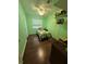 Bright bedroom with wood floors, ceiling fan, and window, ideal for a cozy retreat at 6326 38Th N Ave, St Petersburg, FL 33710