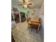 Cozy dining area with tile flooring, wooden table set, and vintage hutch, perfect for Gathering meals at 6326 38Th N Ave, St Petersburg, FL 33710