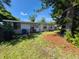 Charming single-story home featuring a brick facade, well-maintained front yard, and inviting curb appeal at 6326 38Th N Ave, St Petersburg, FL 33710