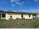 Charming single-story home with a well-maintained front yard and a covered parking area at 6383 Biscayne, North Port, FL 34287