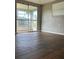 Sunroom with tile floors, large sliding doors to the backyard at 6383 Biscayne, North Port, FL 34287