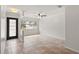 Bright and airy living room featuring tile flooring, a ceiling fan, and ample natural light at 7021 Blossom Ave, Tampa, FL 33614