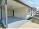 View of the carport attached to the side of the home at 8017 Tudor Pl, Tampa, FL 33610