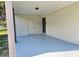 A clean carport attached to a charming home at 8017 Tudor Pl, Tampa, FL 33610