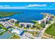 Community features clubhouse, tennis courts, pool, and boat dockage at 8211 Brent St # 815, Port Richey, FL 34668