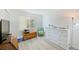 Neutral guest bedroom with luxury vinyl plank flooring and beachy accents at 8211 Brent St # 815, Port Richey, FL 34668