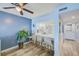 Modern kitchen with a breakfast bar, updated appliances, and an open layout connecting to the living area at 8211 Brent St # 815, Port Richey, FL 34668