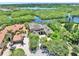 Beautiful aerial view of an upscale neighborhood with lush landscaping and waterfront properties along tranquil waterways at 8707 Silverthorn Rd, Seminole, FL 33777