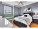 Comfortable bedroom featuring a window bench, soft colors, and ample natural light at 8707 Silverthorn Rd, Seminole, FL 33777