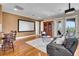 Inviting living room with projector, screen, and stylish furnishings create a perfect entertainment space at 8707 Silverthorn Rd, Seminole, FL 33777