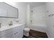 Pristine bathroom featuring modern fixtures, sleek vanity, and a combined shower and bathtub at 9110 Lantern Oak Way, Land O Lakes, FL 34638