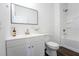 Bathroom featuring modern fixtures, sleek vanity, and a combined shower and bathtub at 9110 Lantern Oak Way, Land O Lakes, FL 34638
