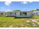 The home boasts a spacious backyard with ample green space, perfect for outdoor activities and relaxation at 10831 Manchester Rd, Port Richey, FL 34668
