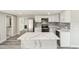 Spacious kitchen layout with stainless steel appliances and marble island at 10831 Manchester Rd, Port Richey, FL 34668