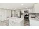 Bright kitchen featuring stainless steel appliances and updated countertops at 10831 Manchester Rd, Port Richey, FL 34668